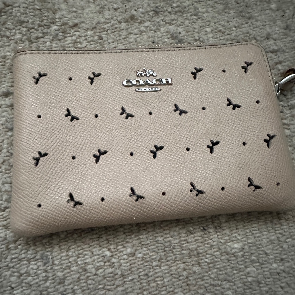 Coach Beige Wristlet with Butterfly Cutouts - Picture 1 of 9